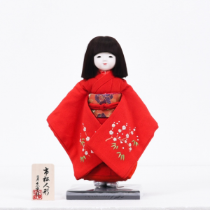 工房朋の赤い衣装を着た女の子の市松人形